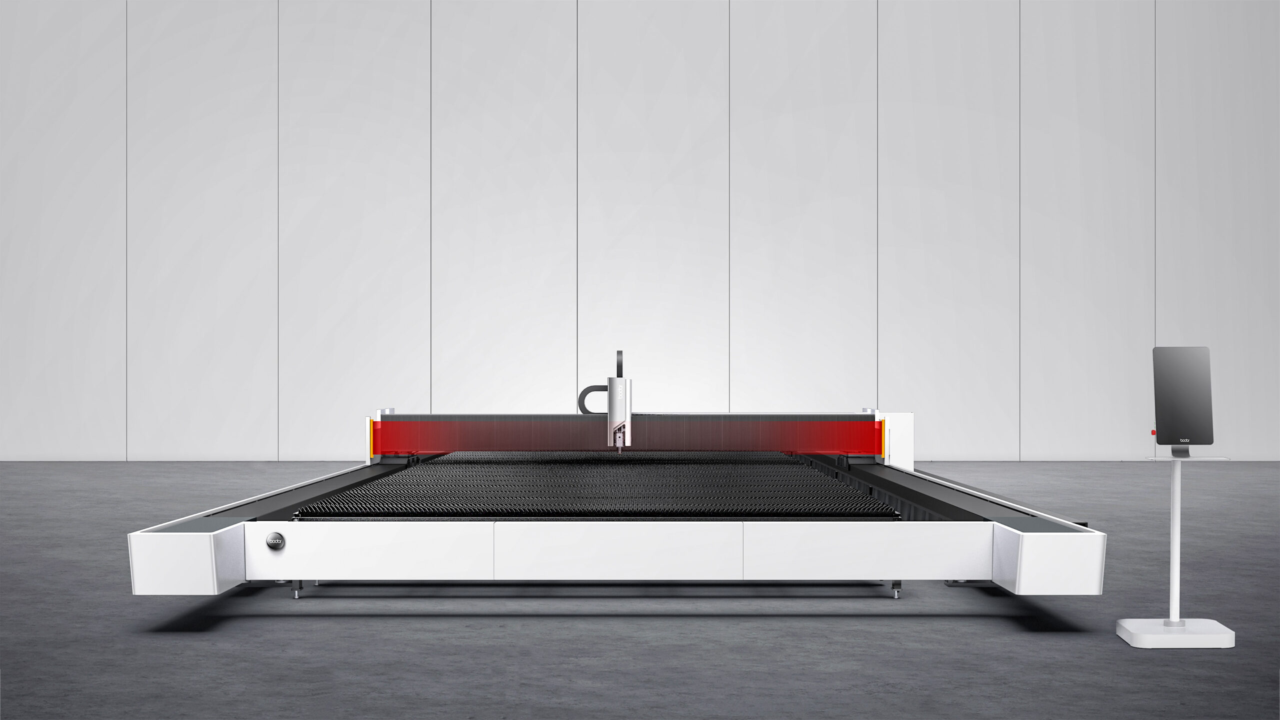Industrial laser cutting machine in a modern workshop with a white base, red guard, and a control console to the right.