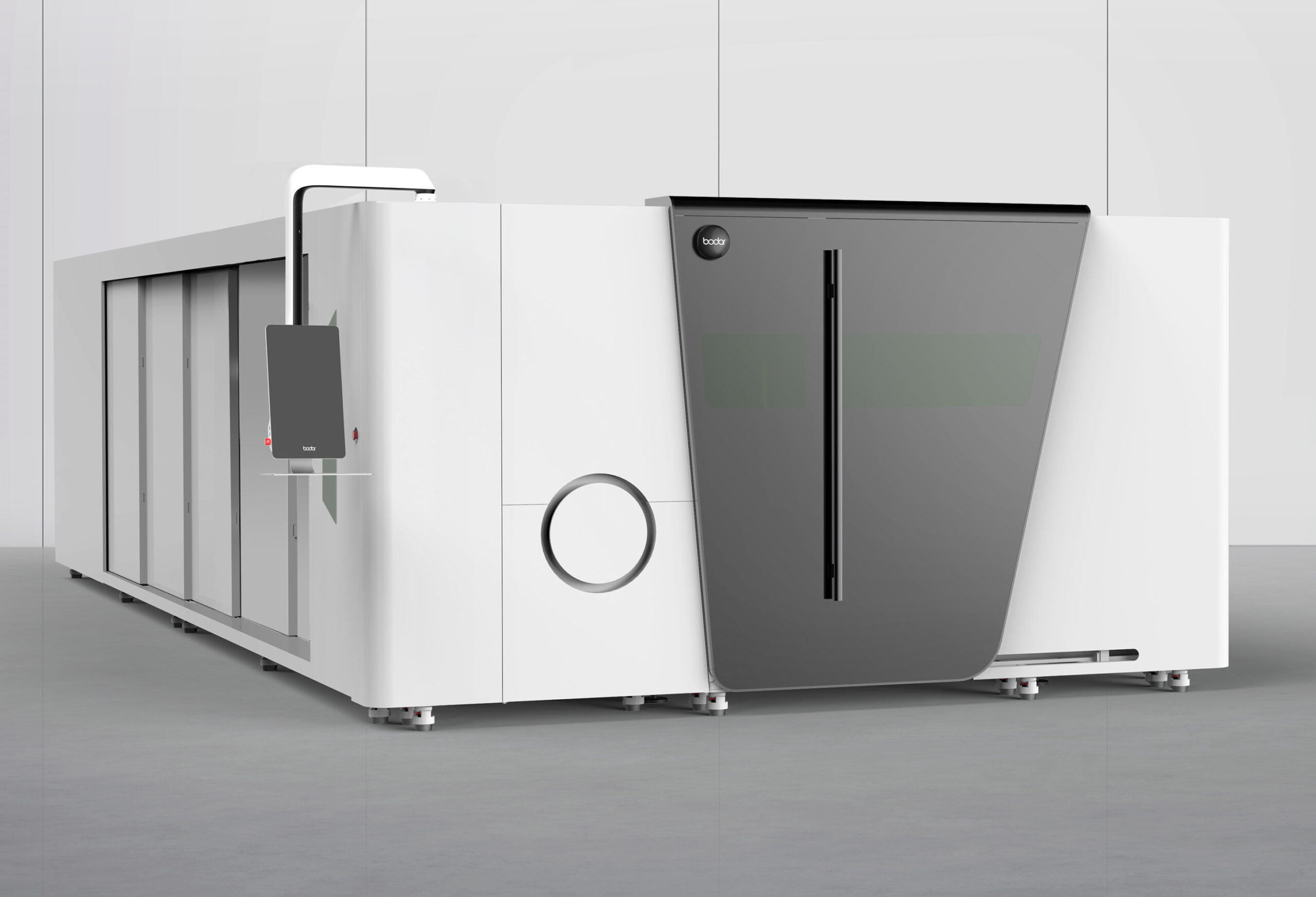 Large white industrial machine with a dark curved front panel in a clean manufacturing environment.