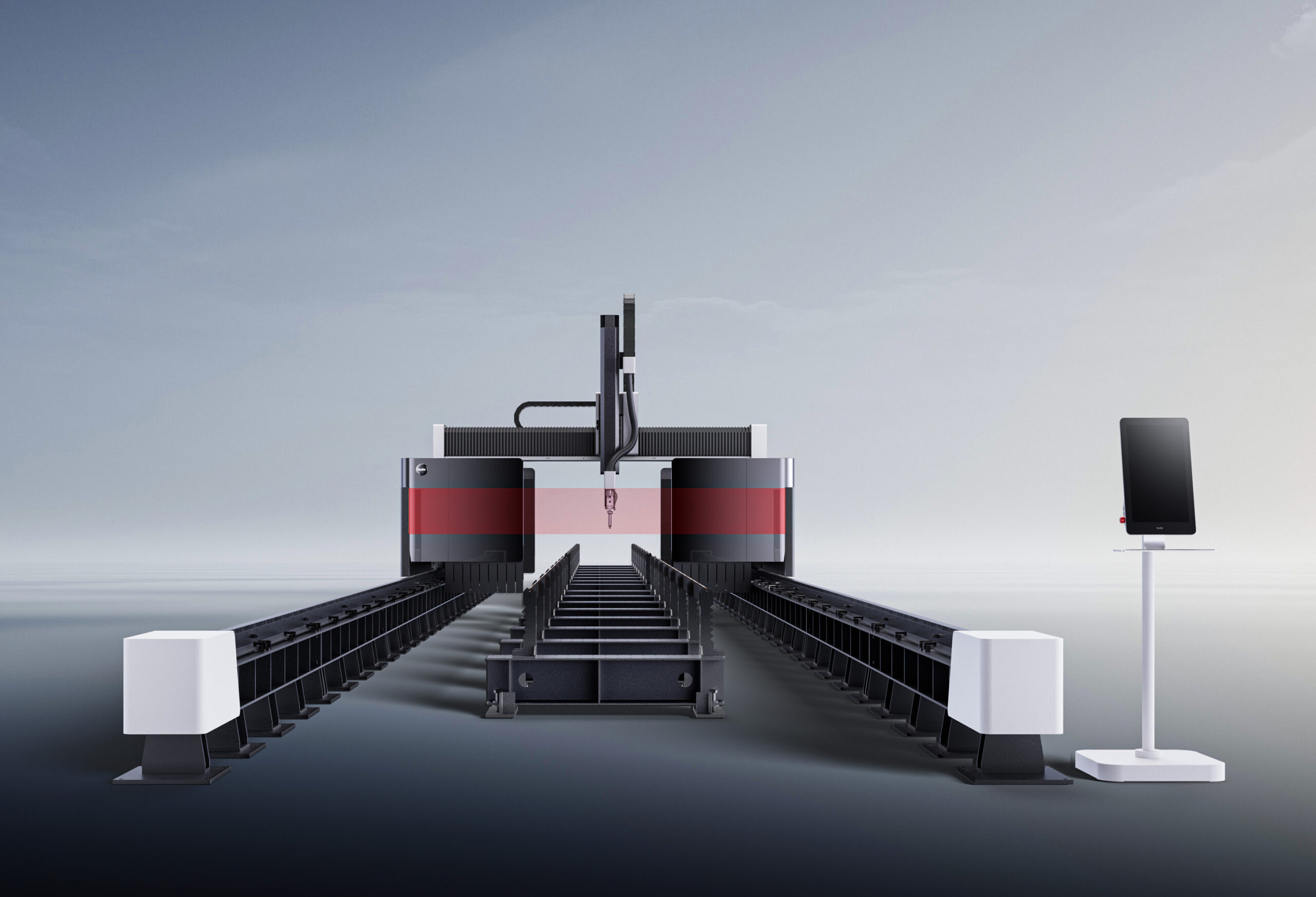 Industrial automated machine on rails with a tall central gantry and a right-side touchscreen monitor in a bright environment.